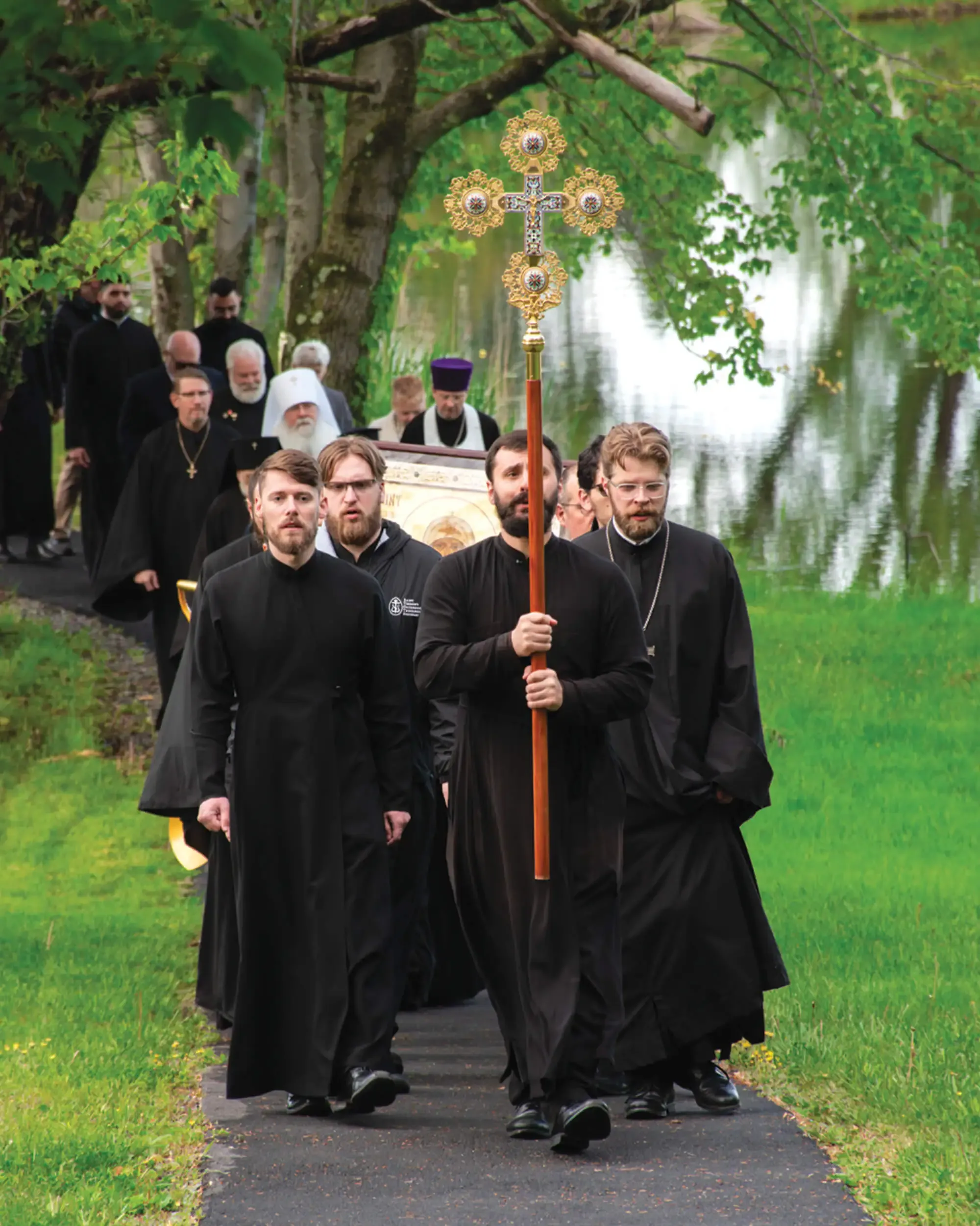 St. Tikhon's Seminary Give Sustainer's Society seminarians processing with the Cross.